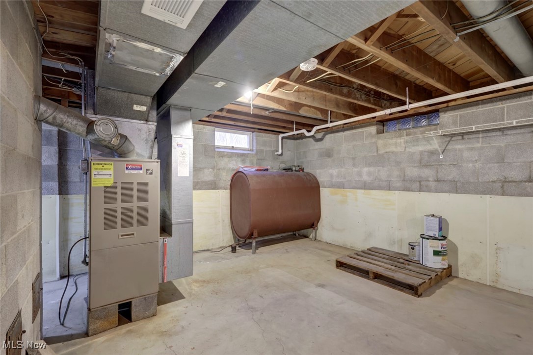 8104 Barnes Road Vermilion, OH 44089 - Photo 31 of 40 Basement with heating unit