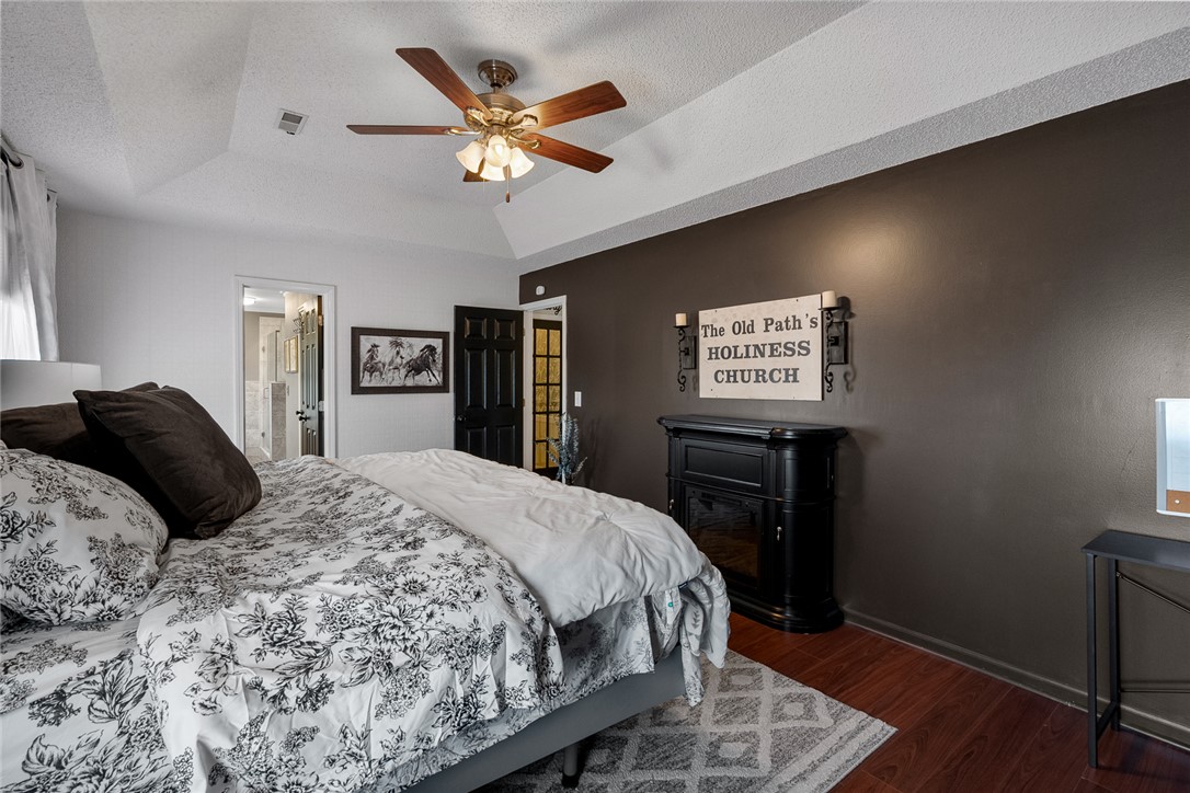 112 C-10-220 Anderson, SC 29621 - Photo 26 of 45 This tranquil bedroom features vaulted ceilings and rich wood flooring, ideal for relaxation.