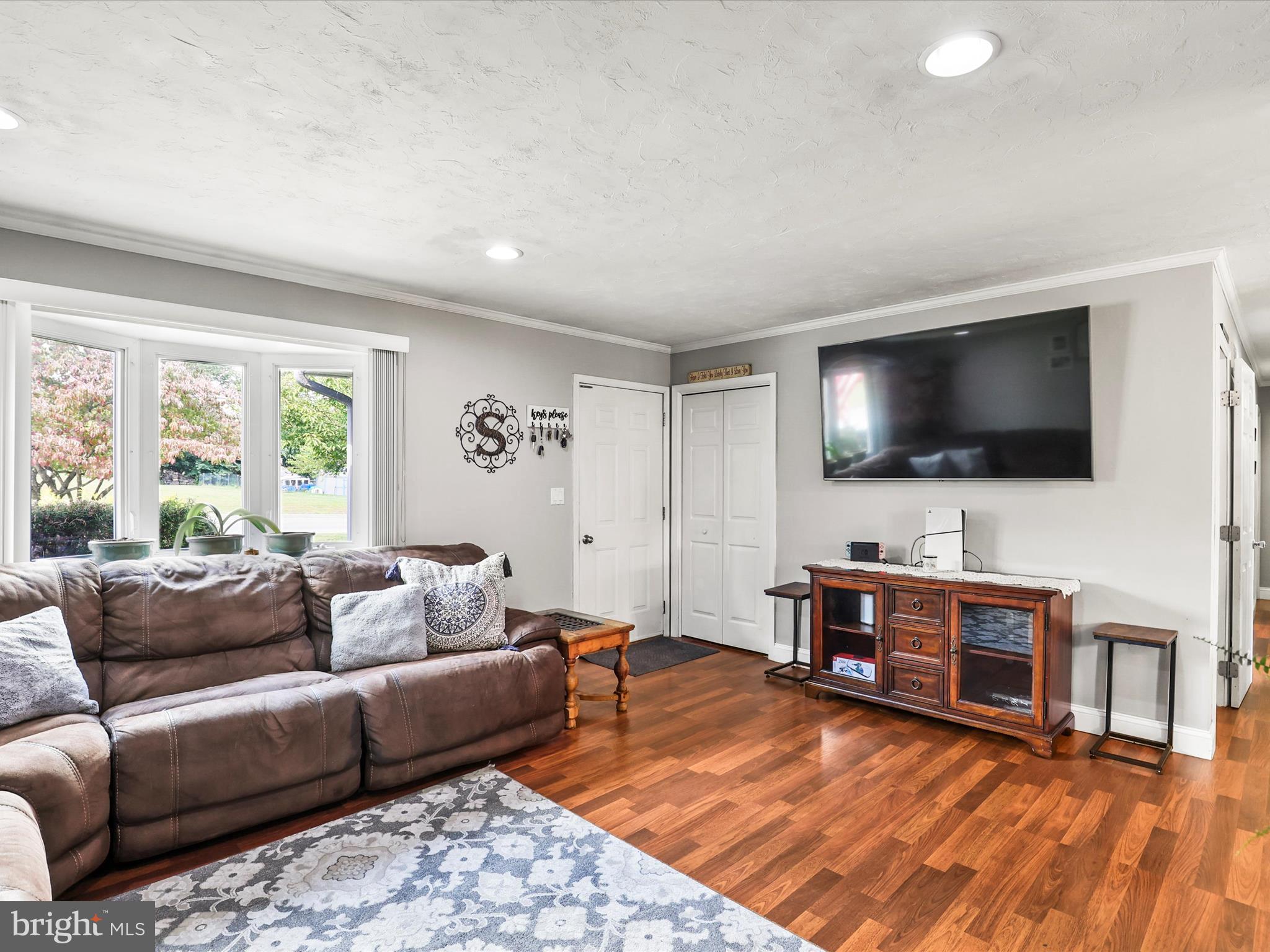 1360 Grandview Road Hanover, PA 17331 - Photo 12 of 36 a living room with furniture and a flat screen tv