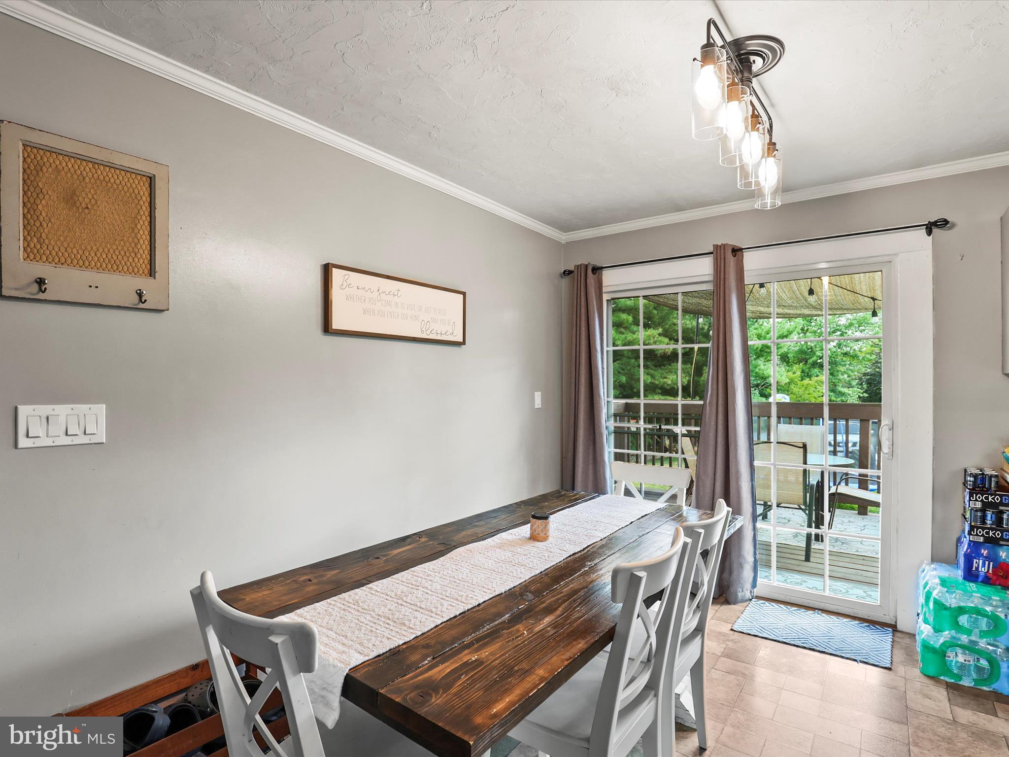1360 Grandview Road Hanover, PA 17331 - Photo 13 of 36 a view of a dining room with furniture window and outside view