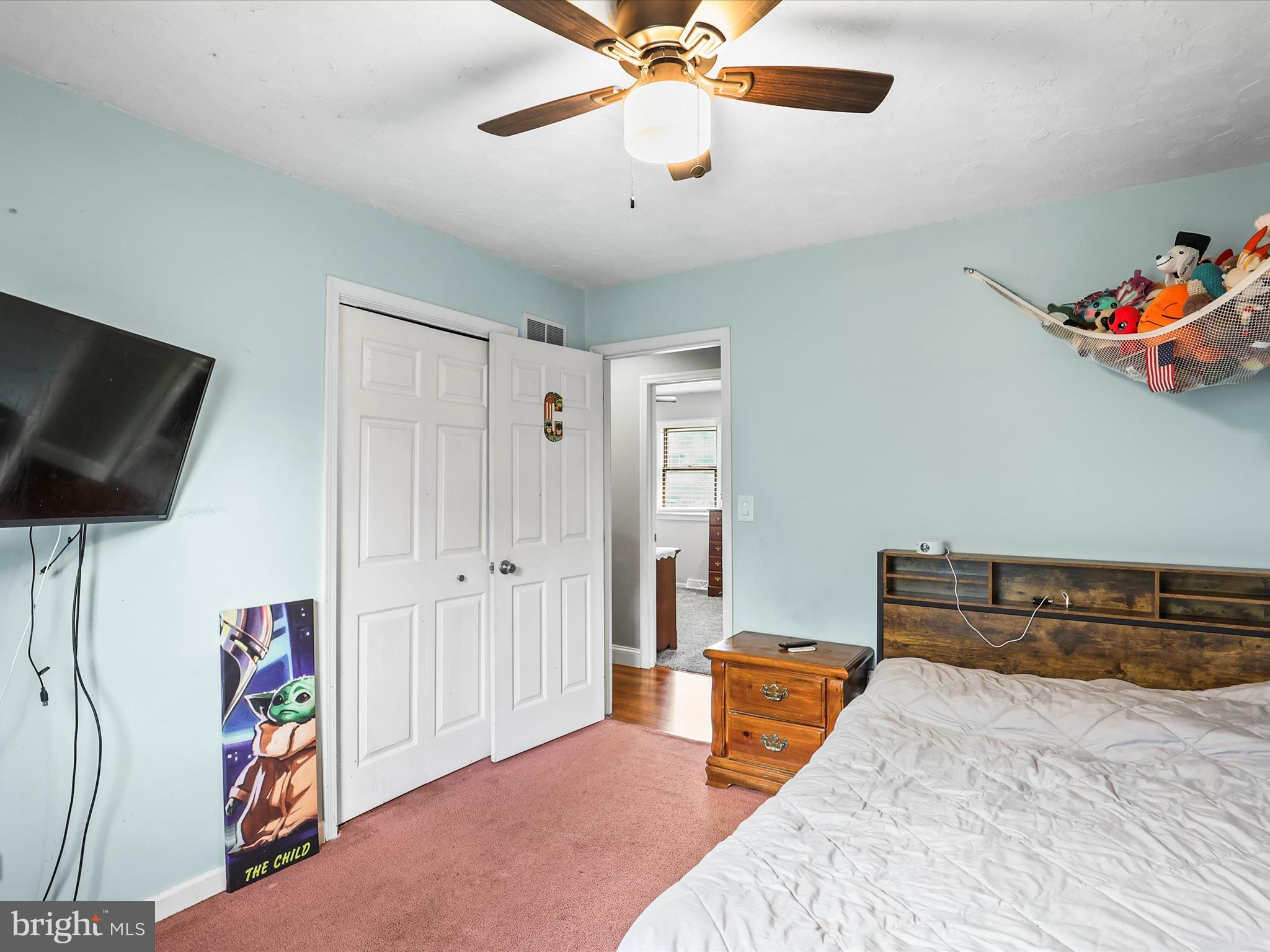 1360 Grandview Road Hanover, PA 17331 - Photo 25 of 36 a bedroom with a bed and a chandelier