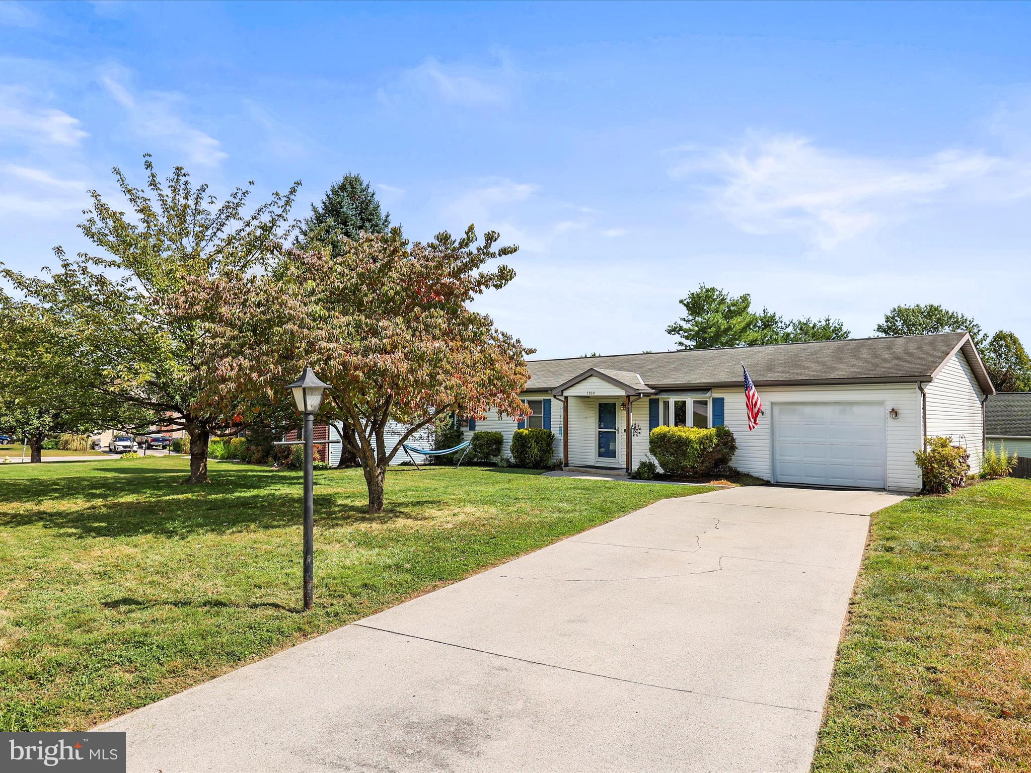 1360 Grandview Road Hanover, PA 17331 - Photo 3 of 36 a front view of a house with a yard and trees