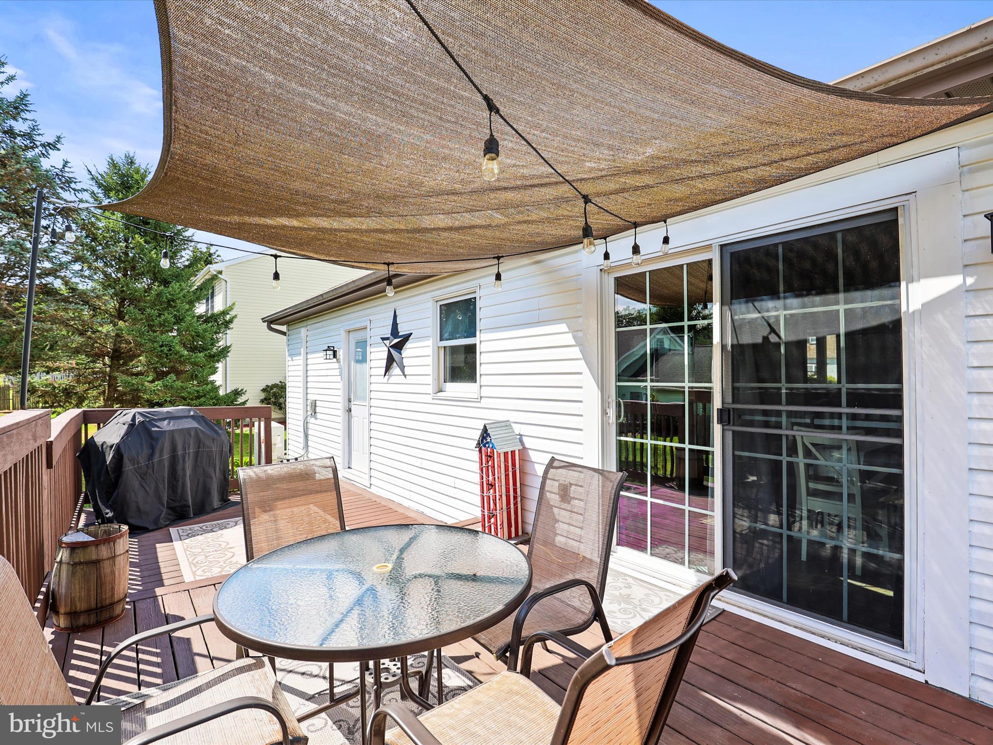 1360 Grandview Road Hanover, PA 17331 - Photo 9 of 36 a balcony with table and chairs and potted plants