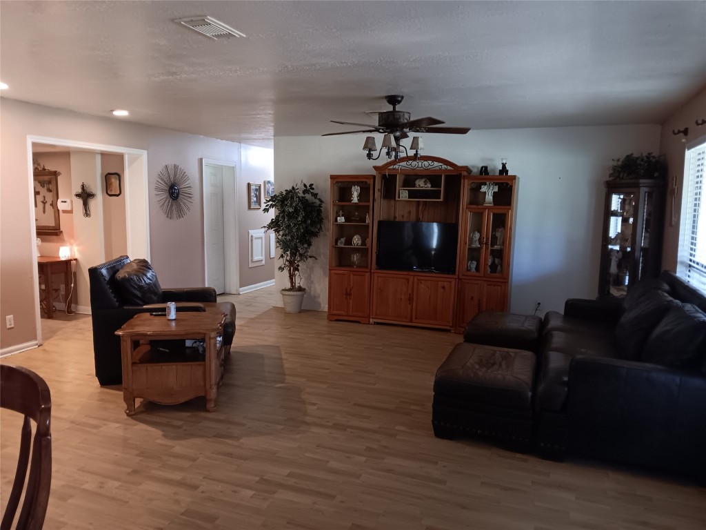 420 Mangum Road Livingston, TX 77351 - Photo 14 of 36 a living room with furniture and a flat screen tv