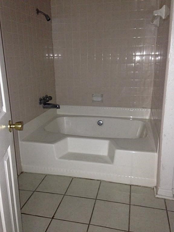 420 Mangum Road Livingston, TX 77351 - Photo 22 of 36 a bathroom with a shower