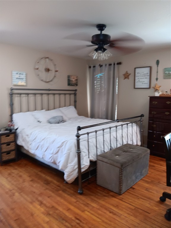 420 Mangum Road Livingston, TX 77351 - Photo 24 of 36 a bed sitting in a bedroom next to a window