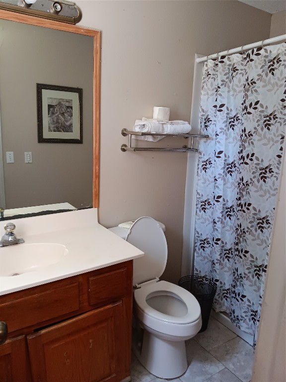 420 Mangum Road Livingston, TX 77351 - Photo 25 of 36 a bathroom with a toilet and a sink