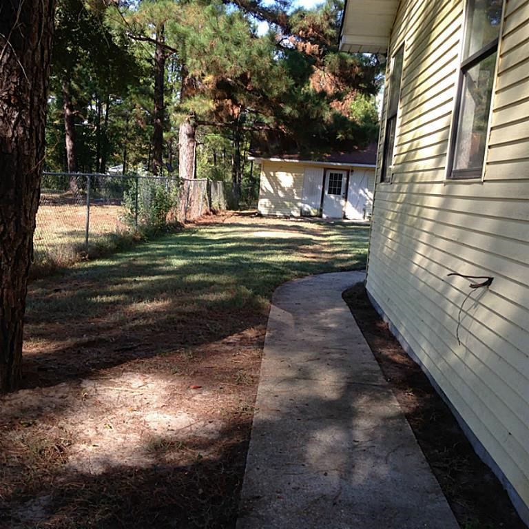420 Mangum Road Livingston, TX 77351 - Photo 27 of 36 a view of yard with patio