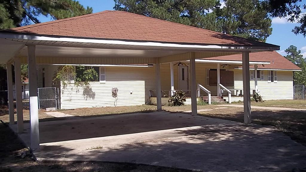 420 Mangum Road Livingston, TX 77351 - Photo 6 of 36 a front view of house with yard