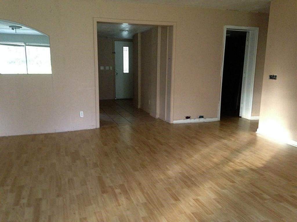 420 Mangum Road Livingston, TX 77351 - Photo 10 of 36 an empty room with closet and windows