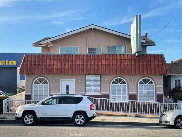 a car parked in front of a house