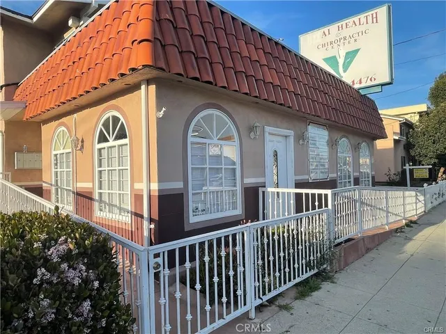 a front view of a building with glass windows