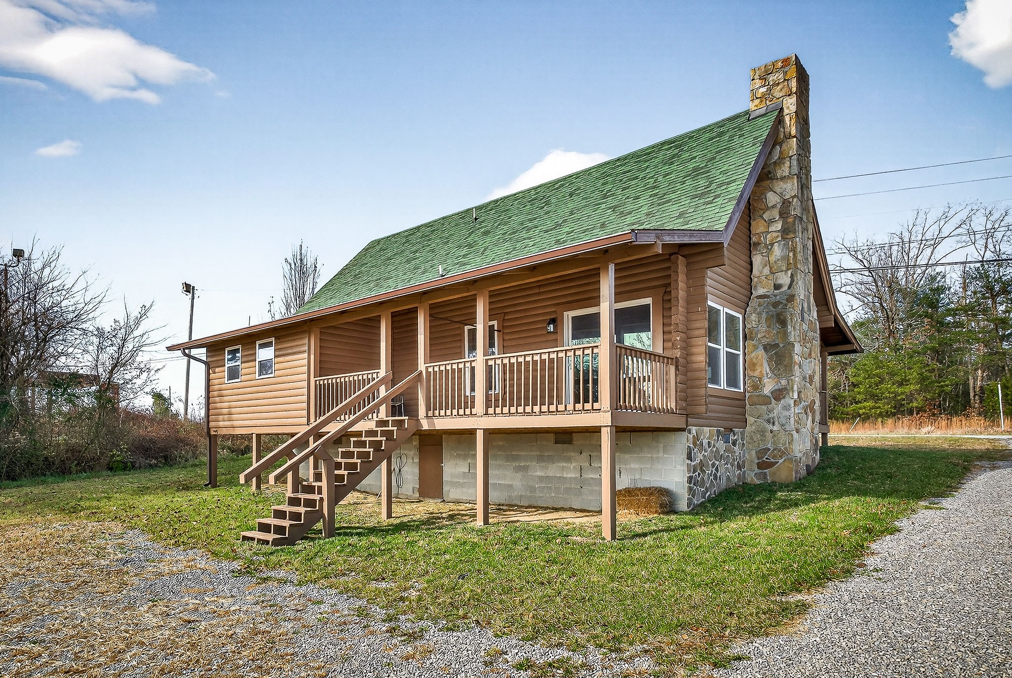 6425 Plateau Road Crossville, TN 38571 - Photo 27 of 42 a view of a house with a yard