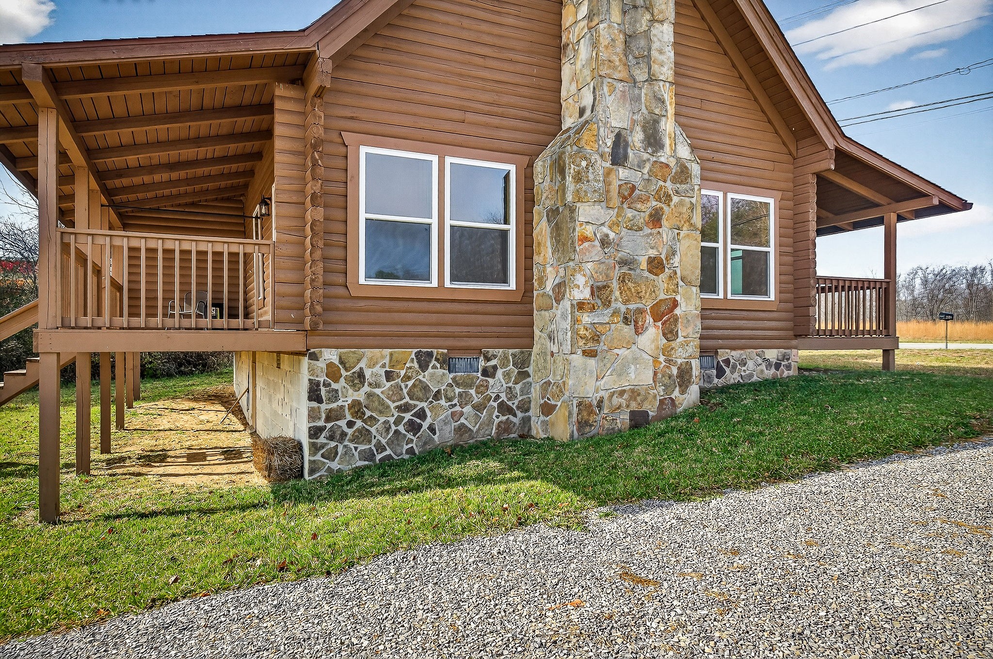 6425 Plateau Road Crossville, TN 38571 - Photo 28 of 42 a view of a house with a yard