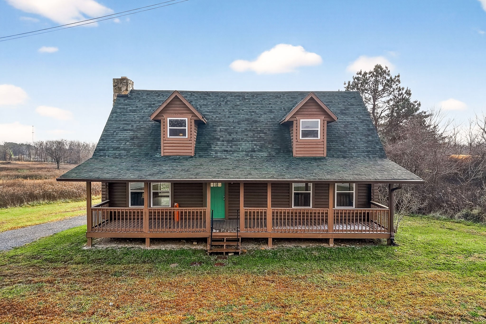 6425 Plateau Road Crossville, TN 38571 - Photo 29 of 42 a front view of a house with a yard