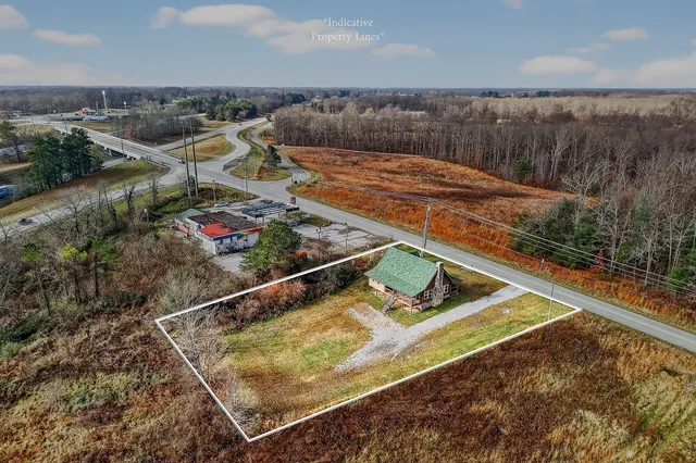 swimming pool view with a lake view