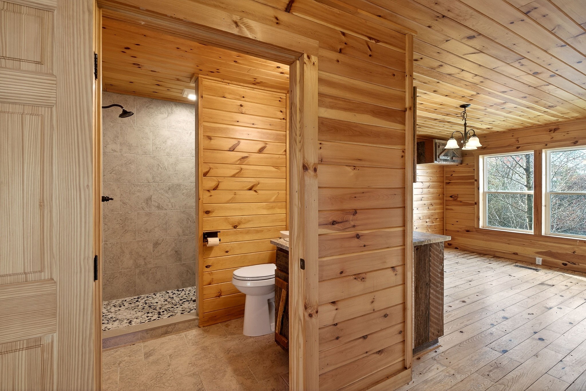 6425 Plateau Road Crossville, TN 38571 - Photo 7 of 42 a bathroom with a toilet and a shower