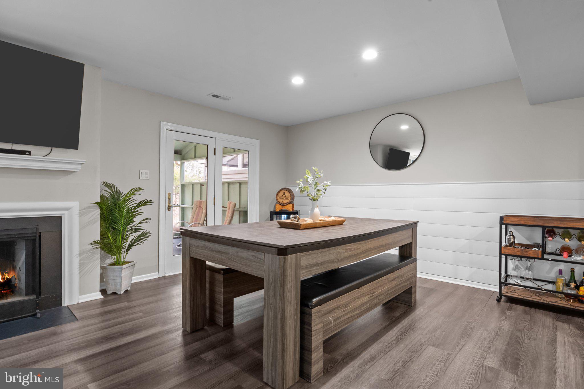 609 Hampton Court Doylestown, PA 18901 - Photo 16 of 41 a living room with furniture and a fireplace