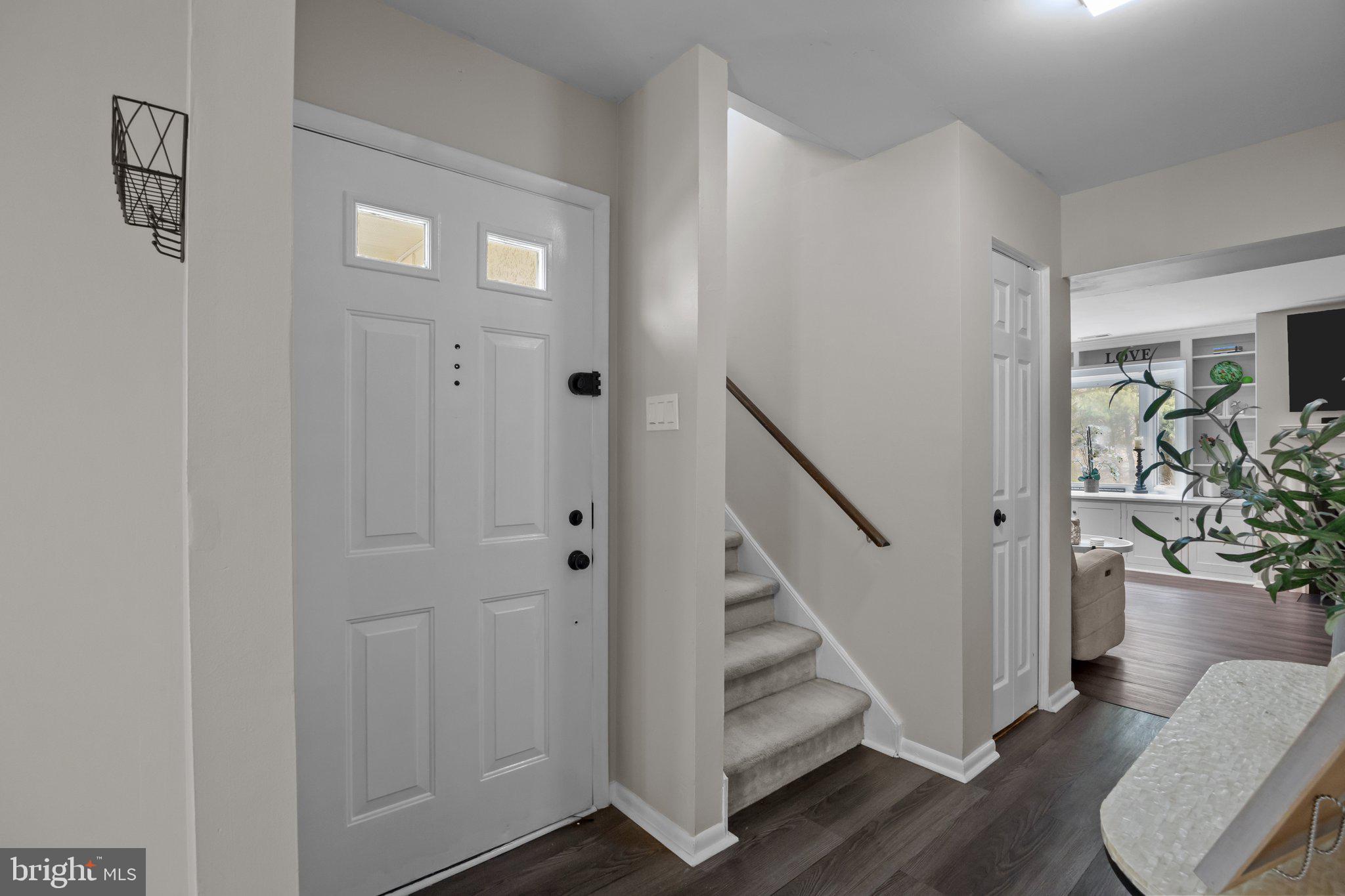 609 Hampton Court Doylestown, PA 18901 - Photo 19 of 41 a view of entryway with livingroom and wooden floor