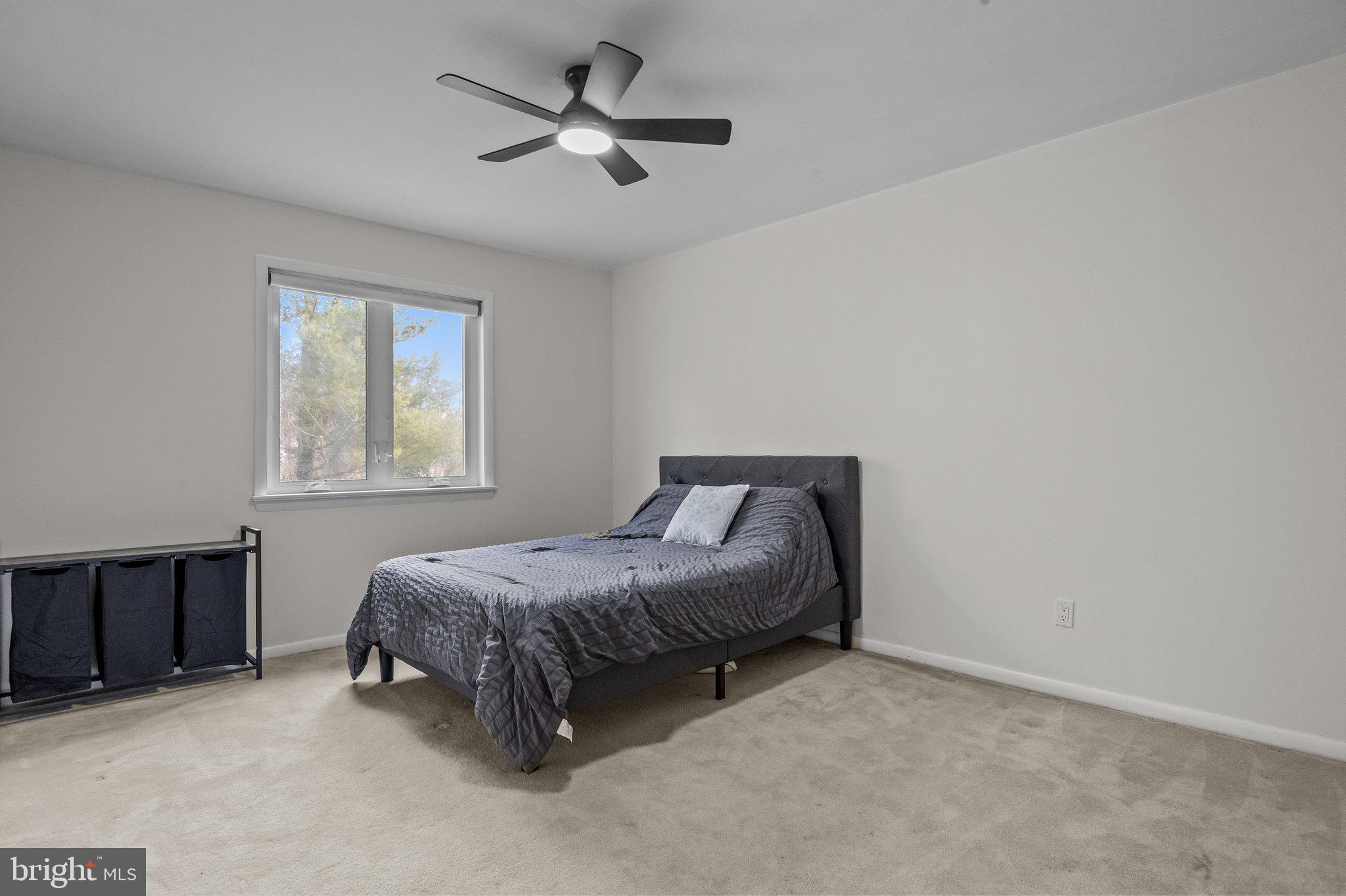 609 Hampton Court Doylestown, PA 18901 - Photo 22 of 41 a bed room with a bed and a window