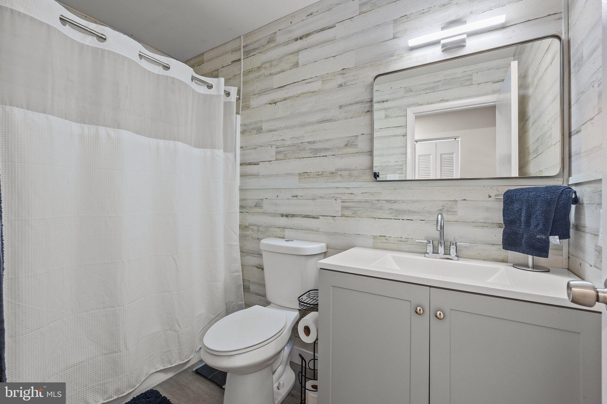 609 Hampton Court Doylestown, PA 18901 - Photo 23 of 41 a bathroom with a sink toilet and mirror