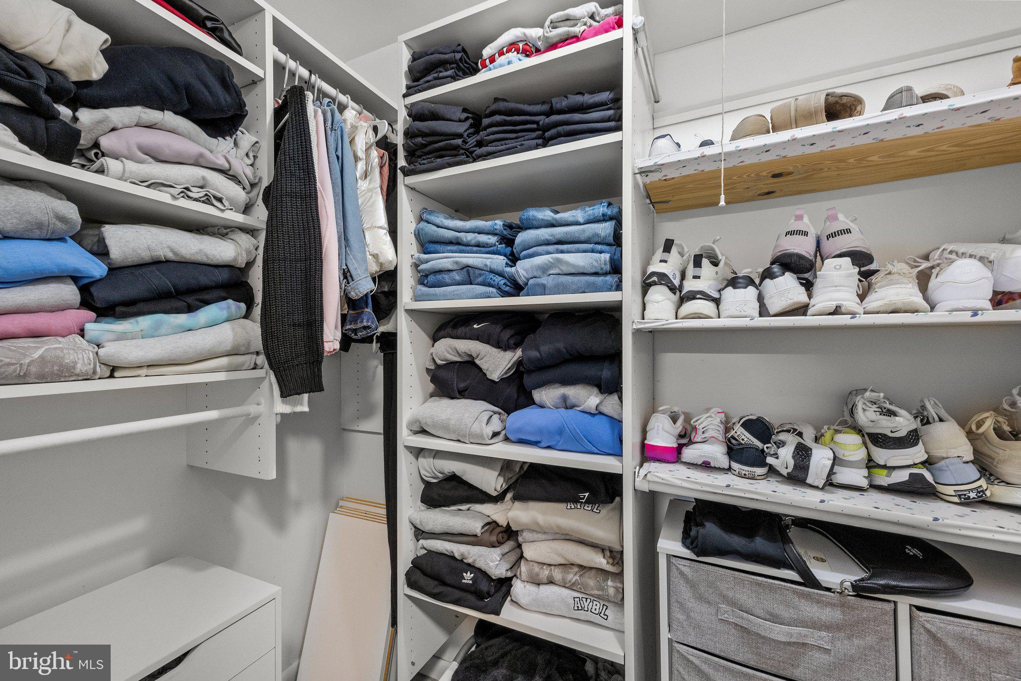 609 Hampton Court Doylestown, PA 18901 - Photo 25 of 41 a view of walk in closet with clothes and shoes