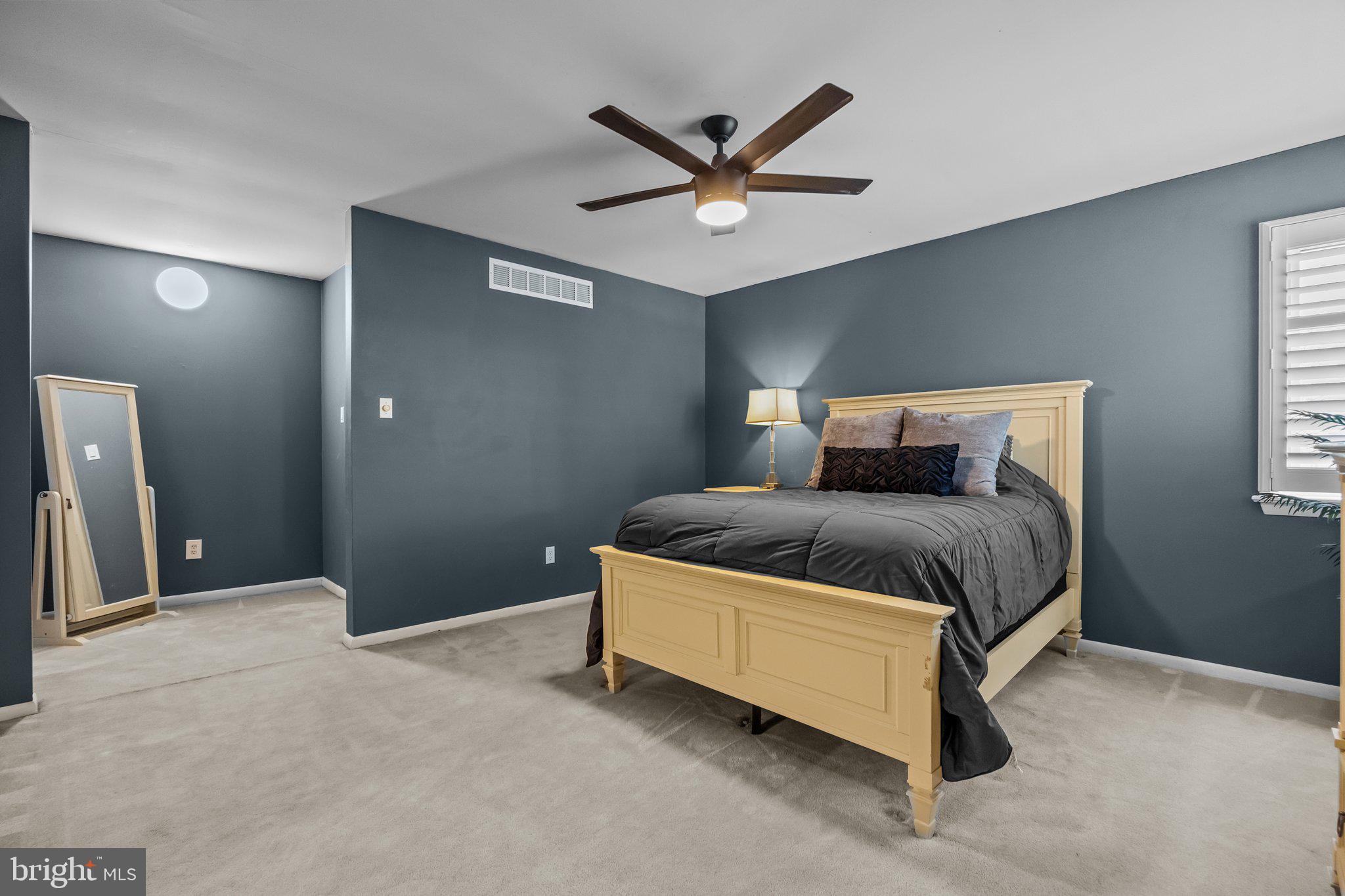 609 Hampton Court Doylestown, PA 18901 - Photo 27 of 41 a bedroom with a bed and window