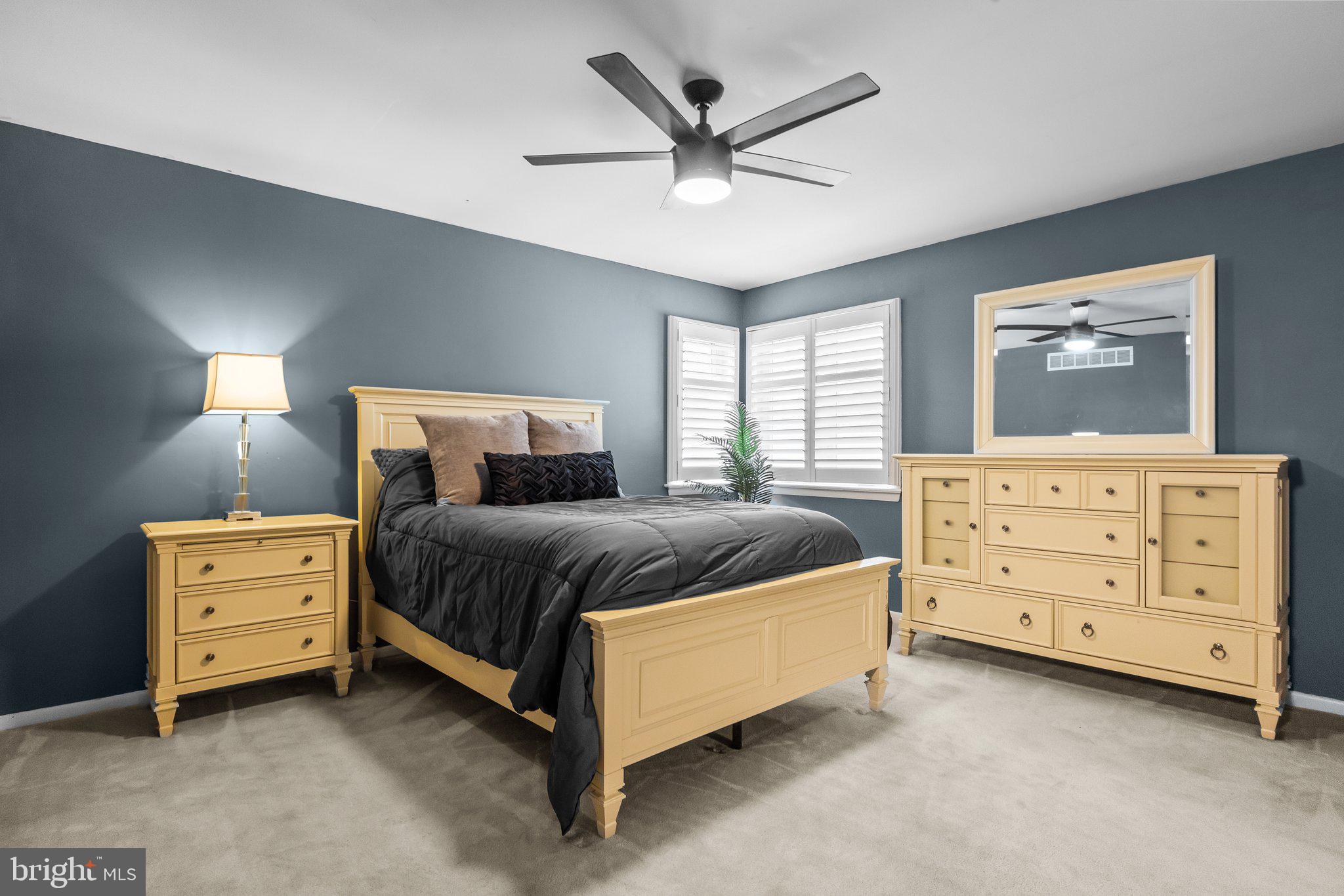 609 Hampton Court Doylestown, PA 18901 - Photo 29 of 41 a bedroom with a bed and a dresser