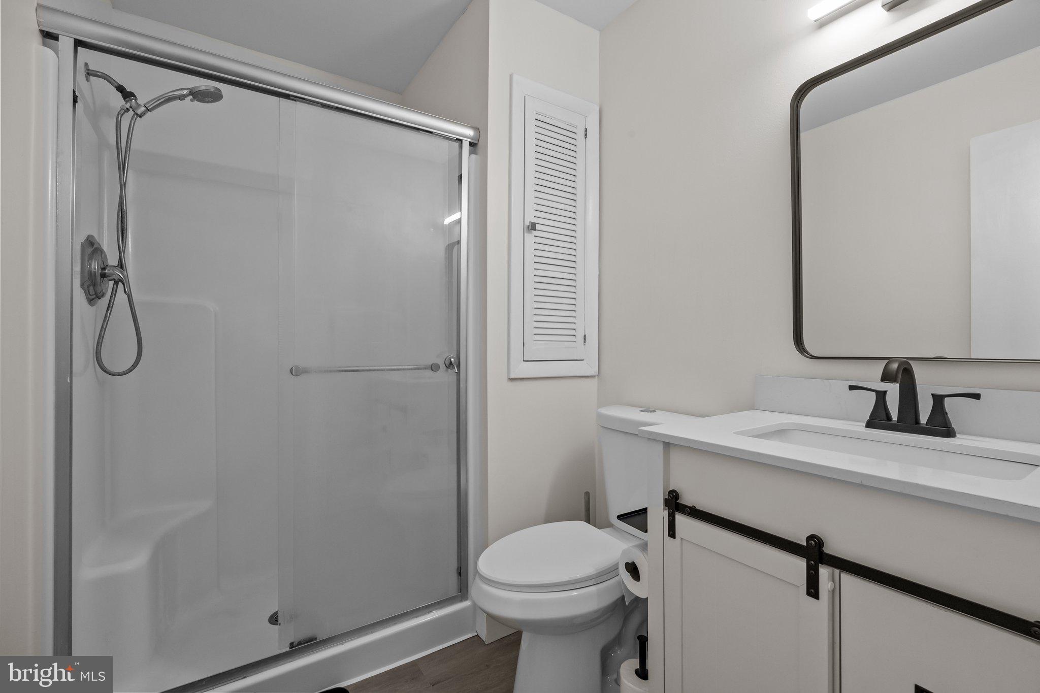 609 Hampton Court Doylestown, PA 18901 - Photo 31 of 41 a bathroom with a granite countertop sink toilet and shower