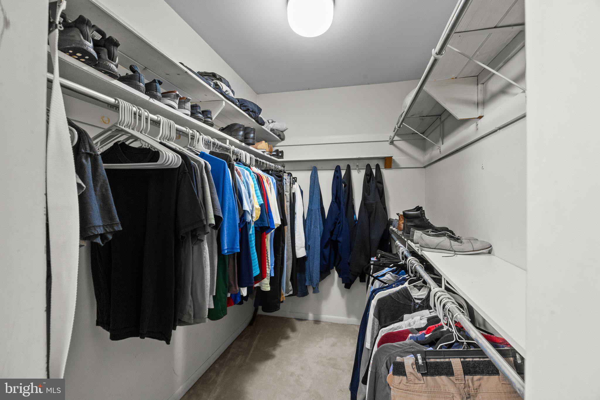 609 Hampton Court Doylestown, PA 18901 - Photo 32 of 41 a view of walk in closet with clothes