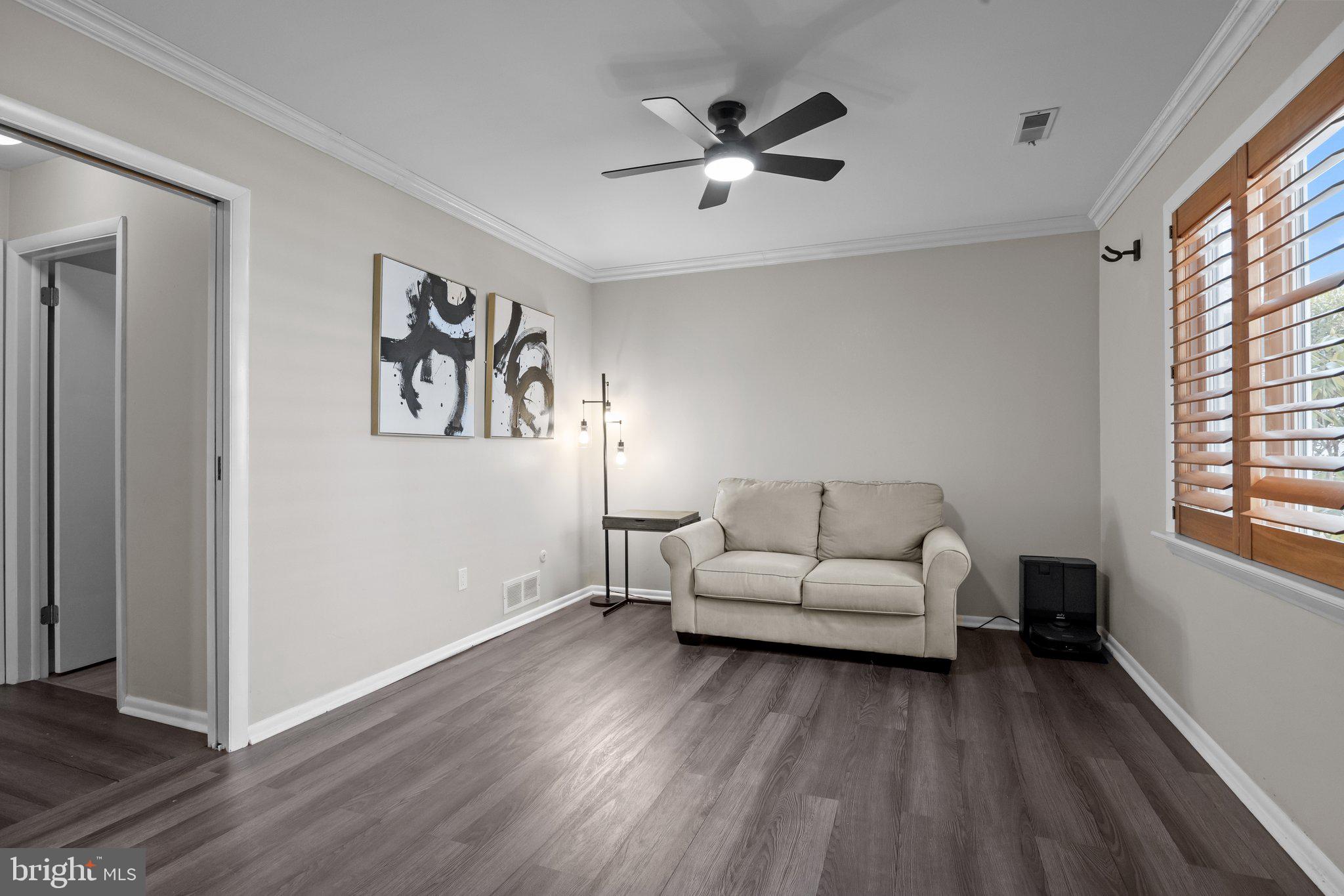 609 Hampton Court Doylestown, PA 18901 - Photo 7 of 41 a living room with furniture and a large window