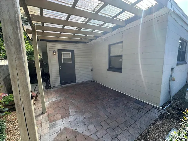 a view of a room with wooden walls