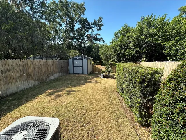 a view of balcony with wooden floor