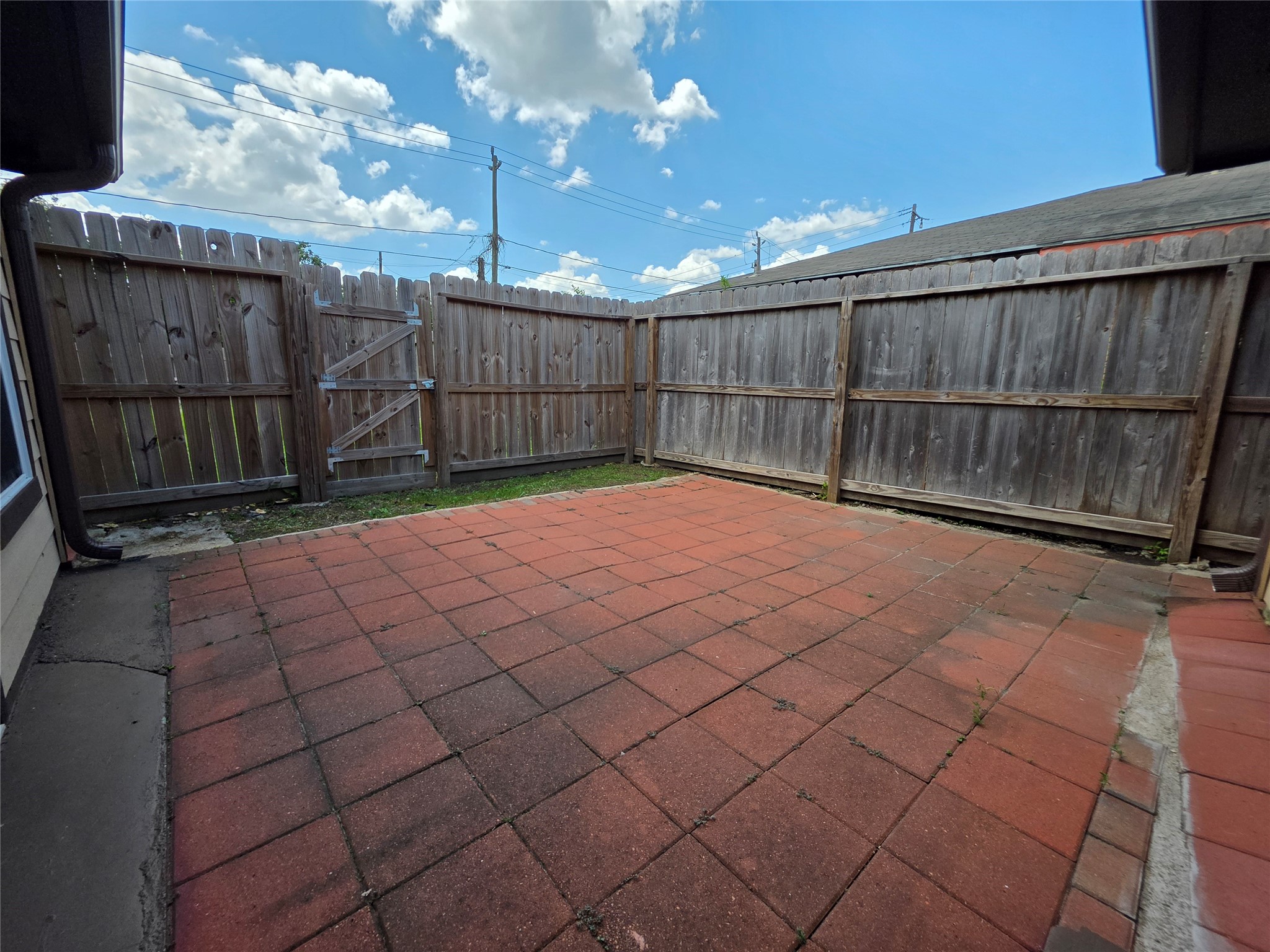 4105 Rutland Street Houston, TX 77018 - Photo 28 of 34 Lots of backyard space for BBQ and hosting. Minimal backyard maintenance required. Gate access to fully fenced empty lot for your use!