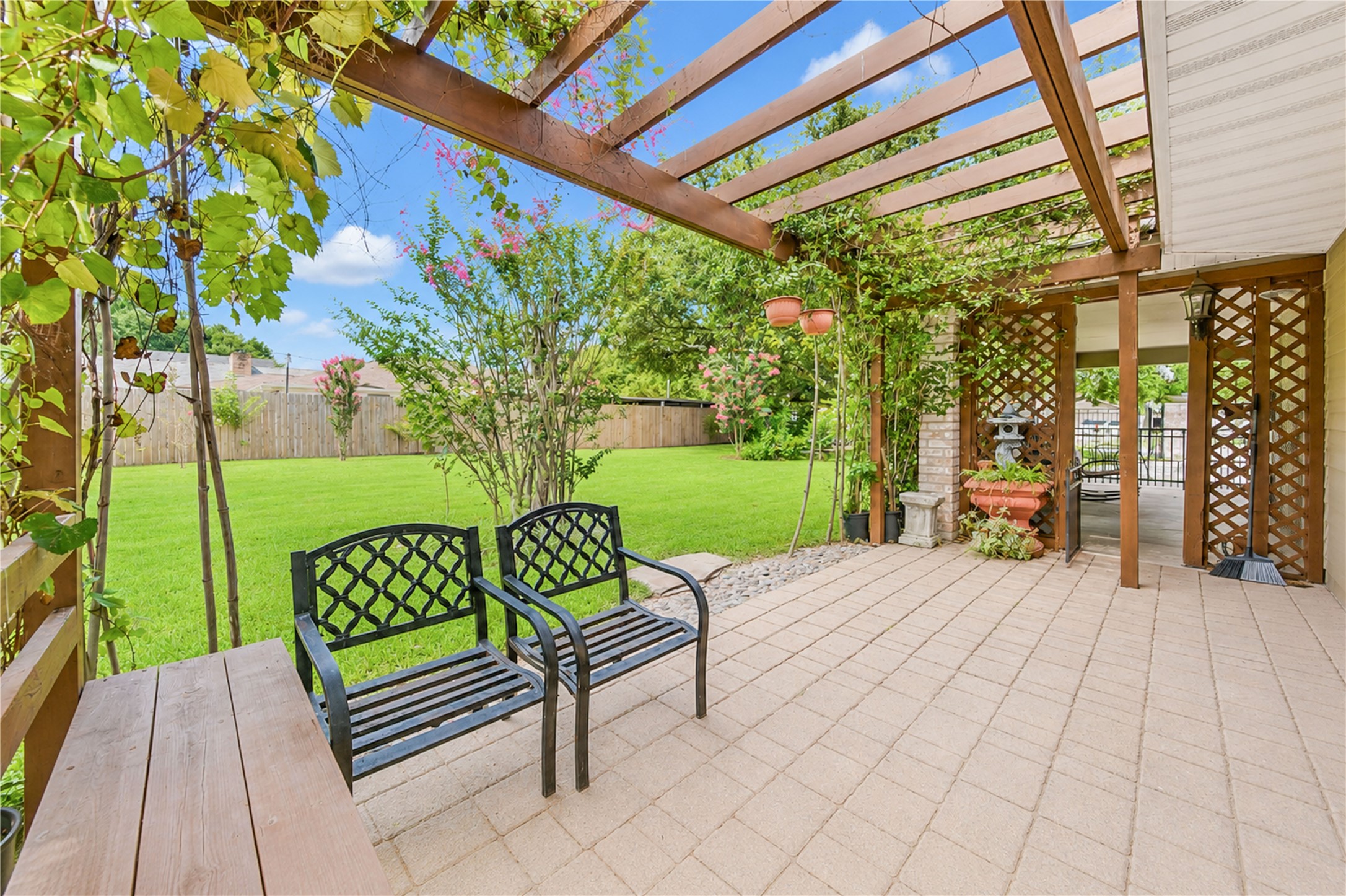 4018 Blalock Road Houston, TX 77080 - Photo 30 of 35 It's a delighful, shaded sanctuary that offers the perfect stting for a cozy outdoor sitting area.