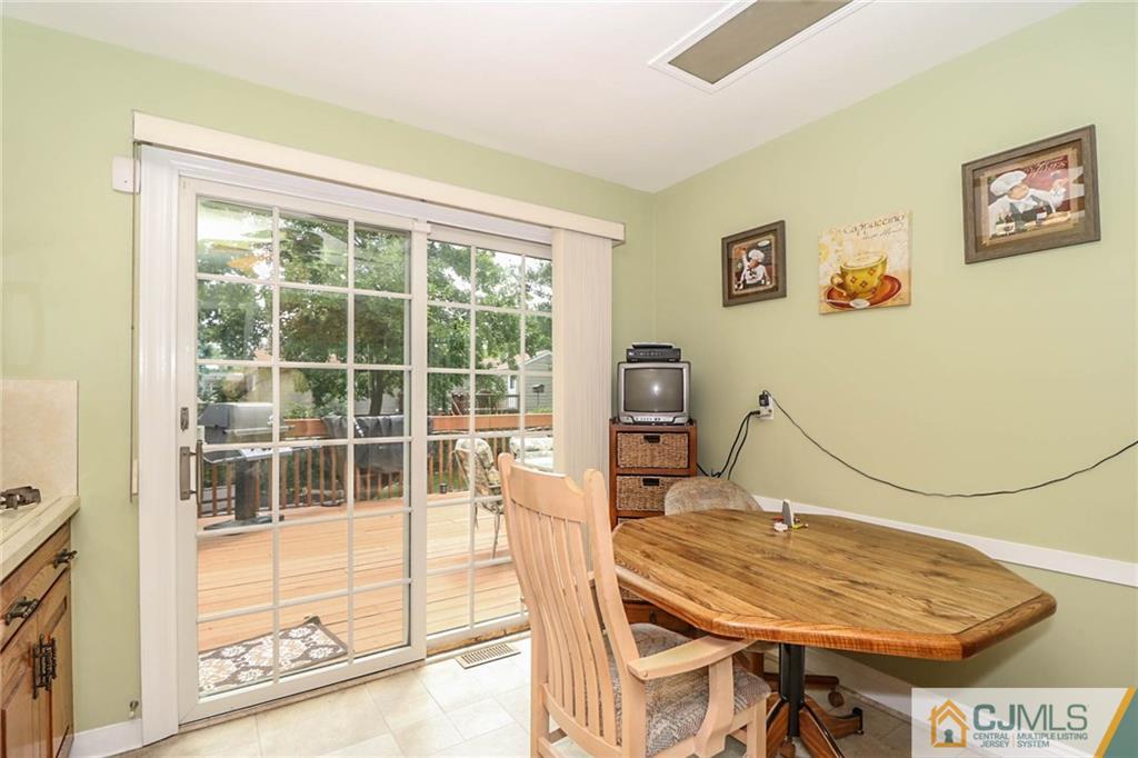 64 Harmon Road Edison, NJ 08837 - Photo 8 of 15 a room with furniture and a window