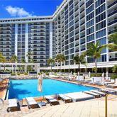 a view of swimming pool with outdoor seating