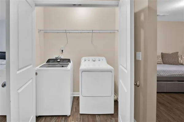 a utility room with dryer and washer