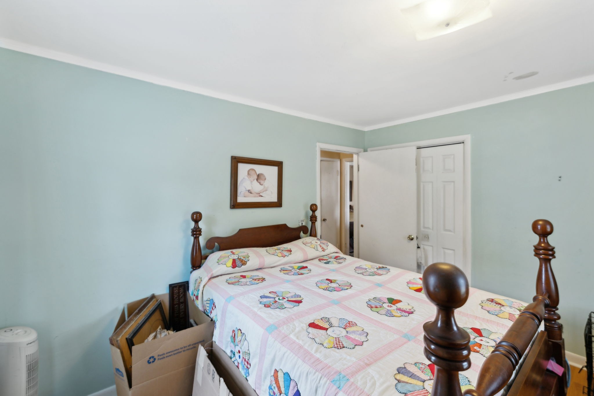 503 West 4th Avenue Springfield, TN 37172 - Photo 12 of 32 a bedroom with a bed and a table