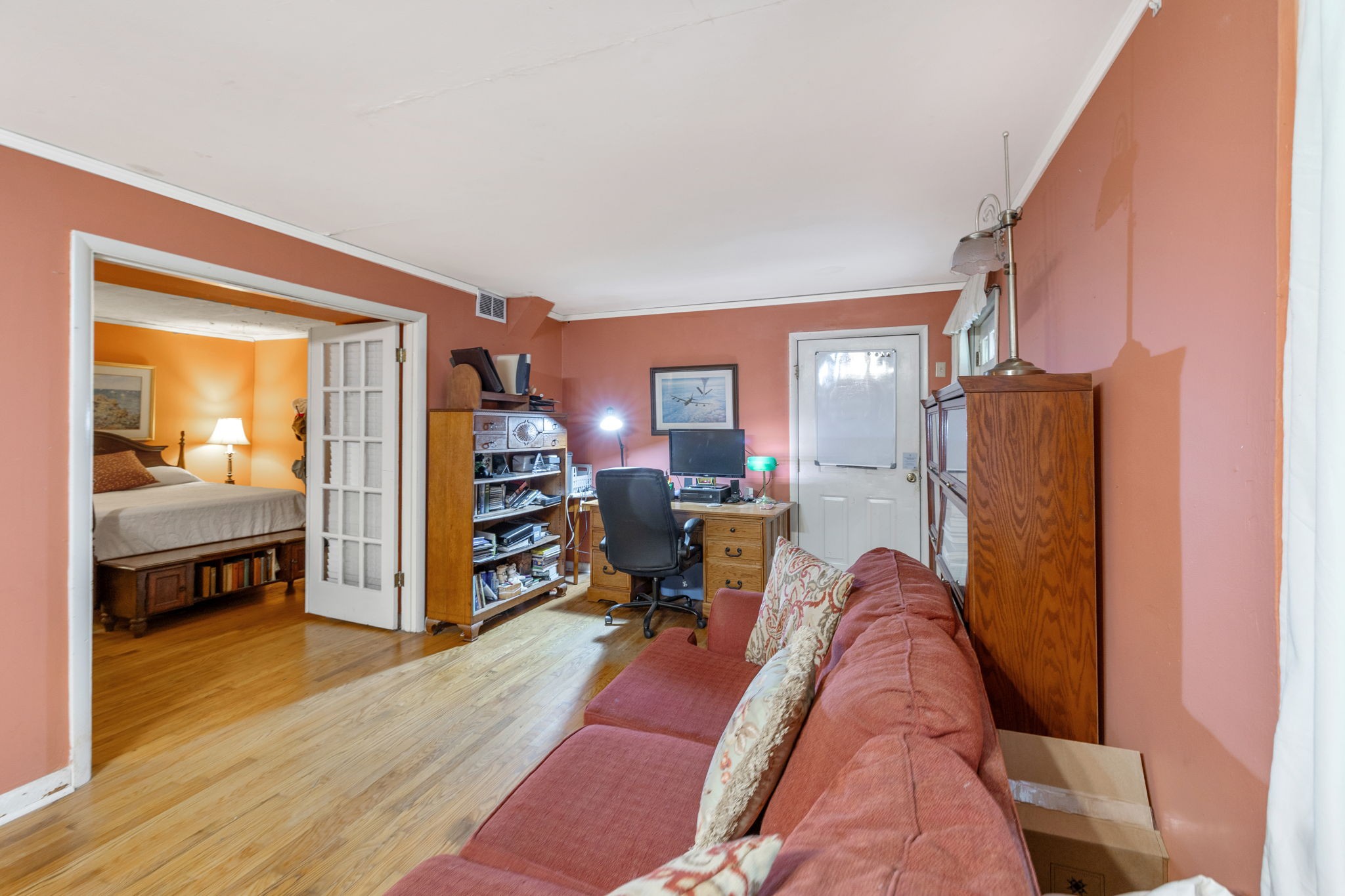 503 West 4th Avenue Springfield, TN 37172 - Photo 17 of 32 a living room with furniture and a wooden floor
