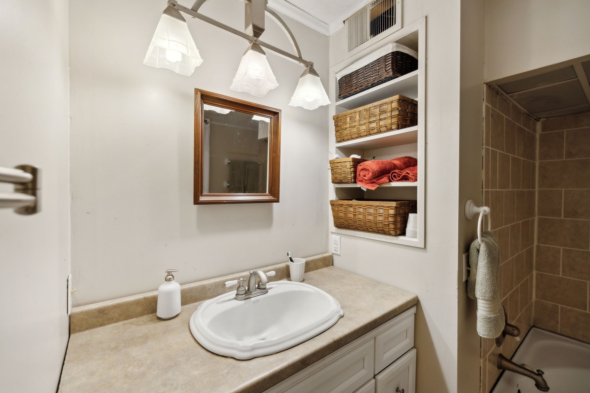503 West 4th Avenue Springfield, TN 37172 - Photo 23 of 32 a bathroom with a sink a vanity and a mirror