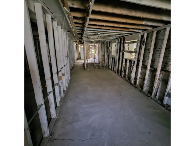 925 South Springfield Avenue Chicago, IL 60624 - Photo 13 of 14 a view of a hallway with staircase