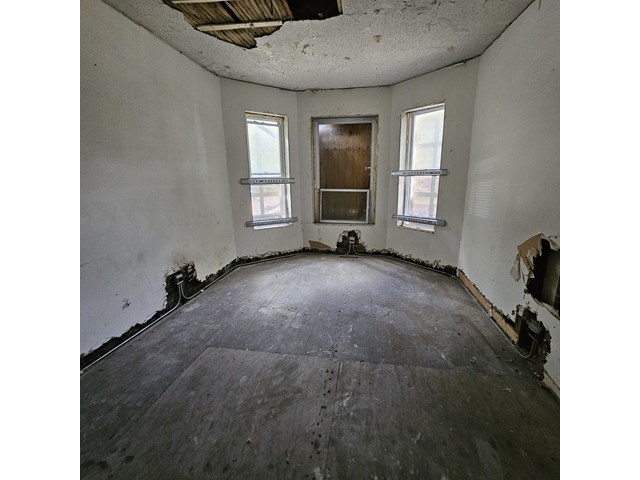 925 South Springfield Avenue Chicago, IL 60624 - Photo 3 of 14 a view of an empty room with a window