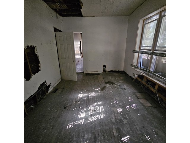 925 South Springfield Avenue Chicago, IL 60624 - Photo 10 of 14 a view of a livingroom with furniture and staircase