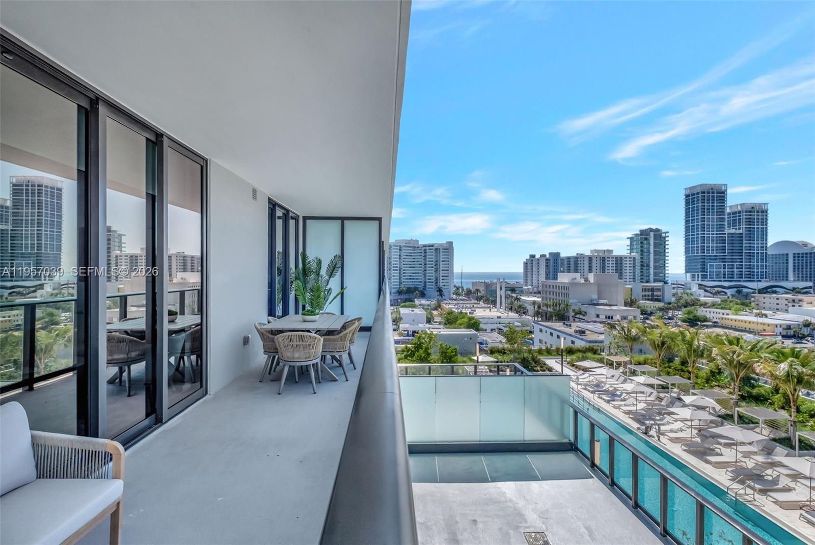 580 72nd Street, Unit 808 Miami Beach, FL 33141 - Photo 5 of 29 a view of a city from a balcony