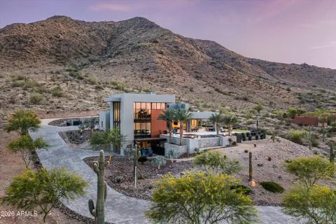 a view of a backyard of the house