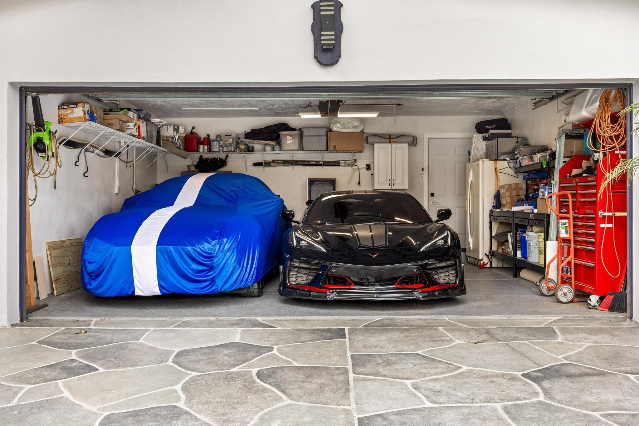 2531 Northeast 47th Street Lighthouse Point, FL 33064 - Photo 14 of 52 a car parked in a garage