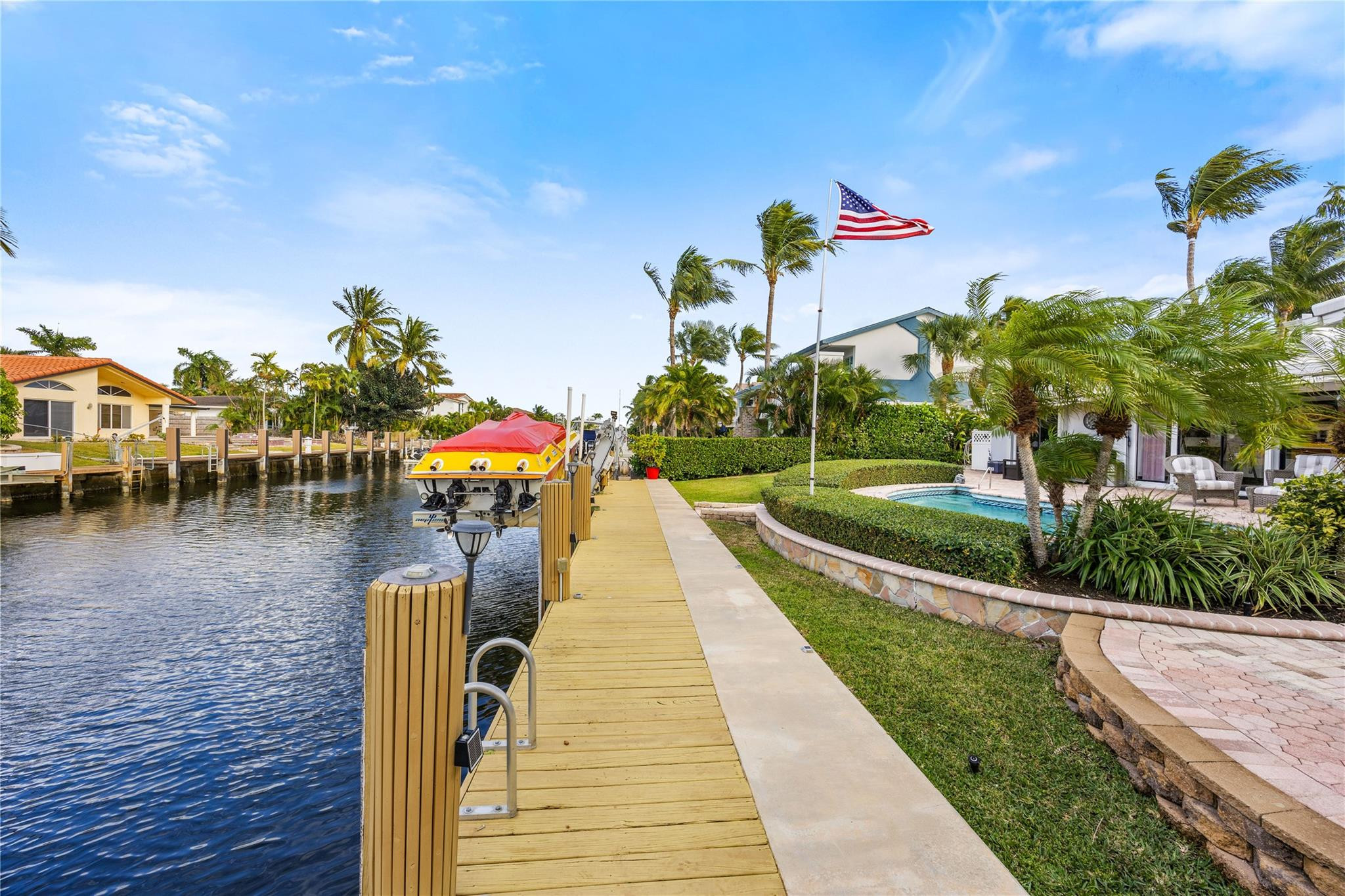 2531 Northeast 47th Street Lighthouse Point, FL 33064 - Photo 51 of 52 a park with lots of potted plants