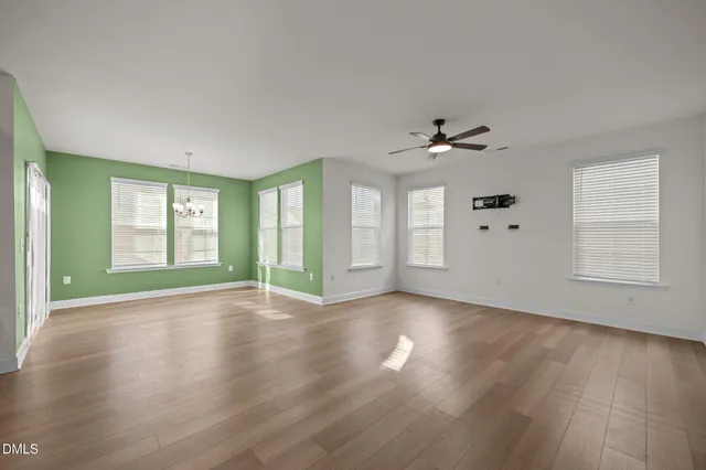 a bathroom with a toilet a sink and a mirror