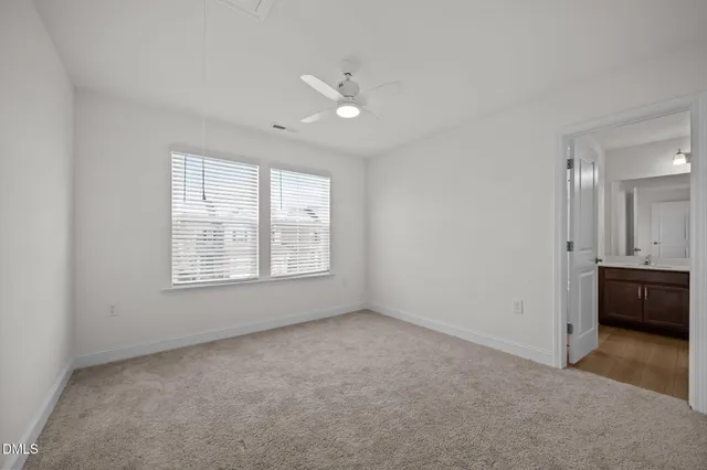 a bathroom with a sink double vanity and a mirror